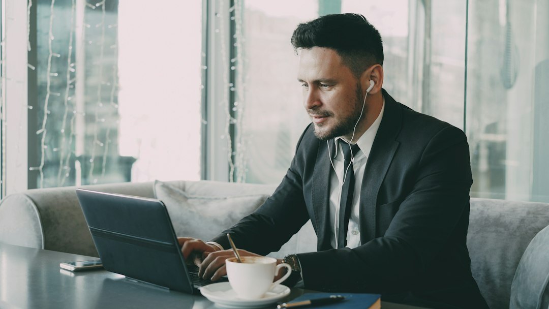 business leader at computer