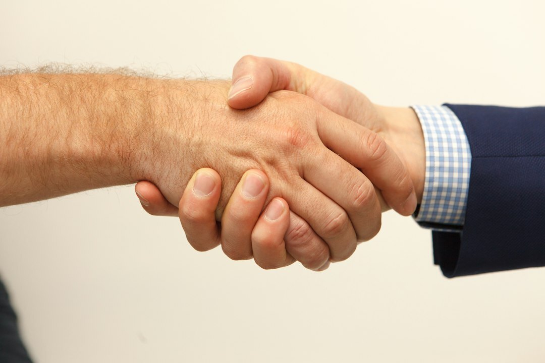 executive team handshake