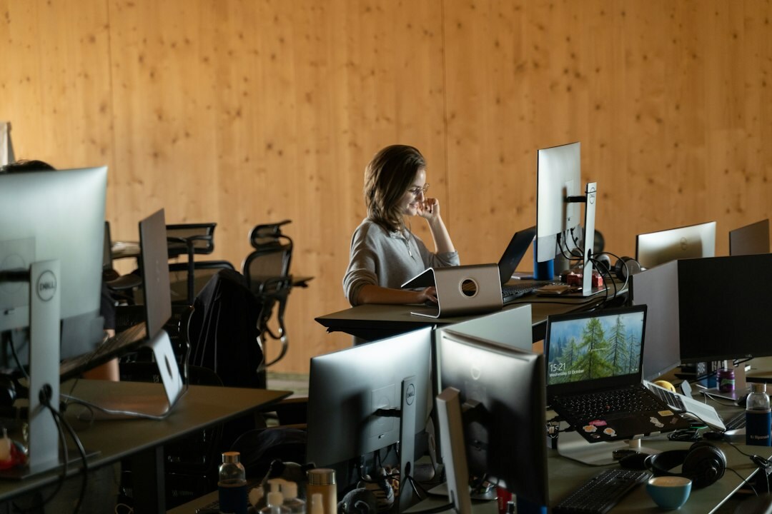 woman coding at desk